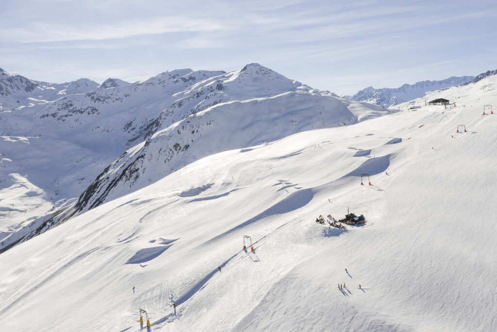 Andermatt ski resort in Switzerland on a bluebird day