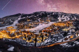 The town of Aspen, Colorado lit up at night during the winter