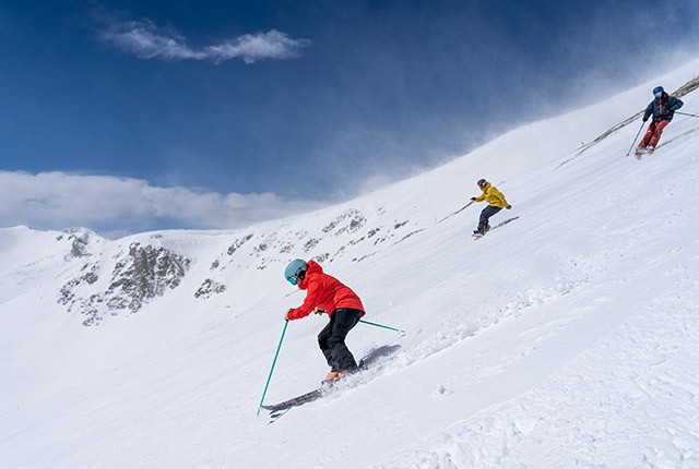 Skiers bowl Breckenridge.