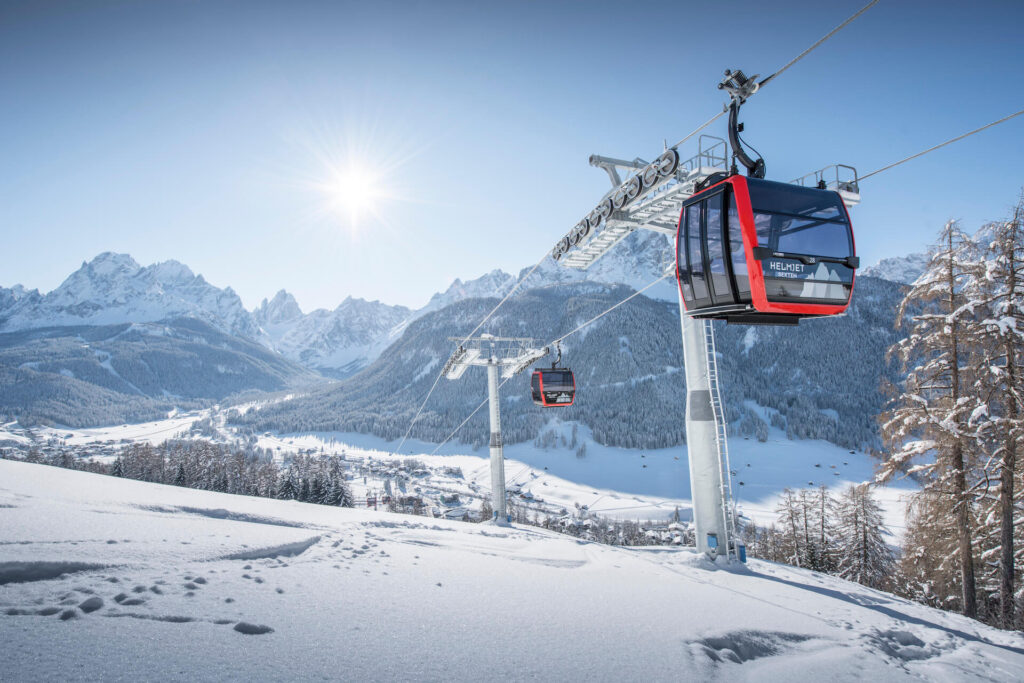 3 Zinnen Dolomites Ski Resort gondolas on a sunny winter day