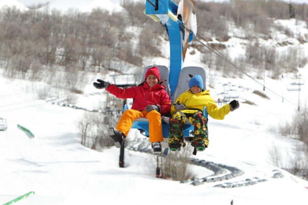 Kids enjoying the ride up aboard Flying Eagle