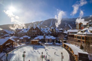 Bluebird day in winter at Spruce Peak Village in Stow