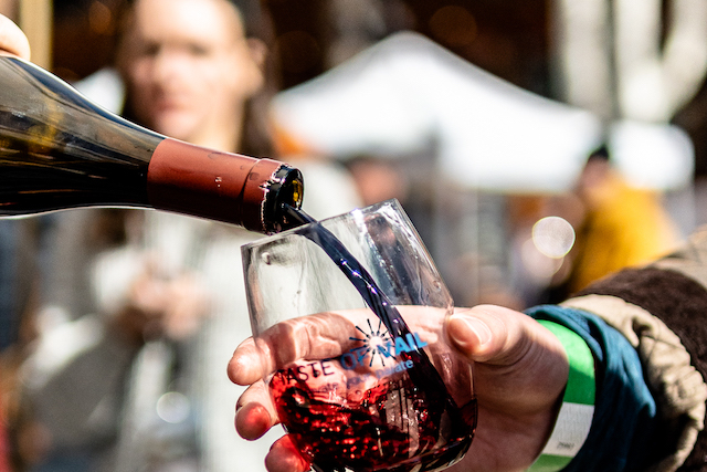 Pouring wine at Taste of Vail Food and Drink Festival