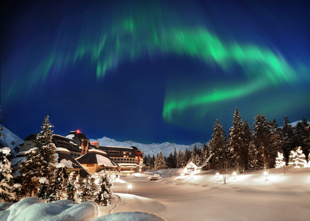 The Northern Lights dancing above Alyeska Resort near Anchorage